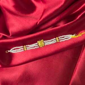 Multi-Strand Pearl Choker with Traditional Gold Pendant