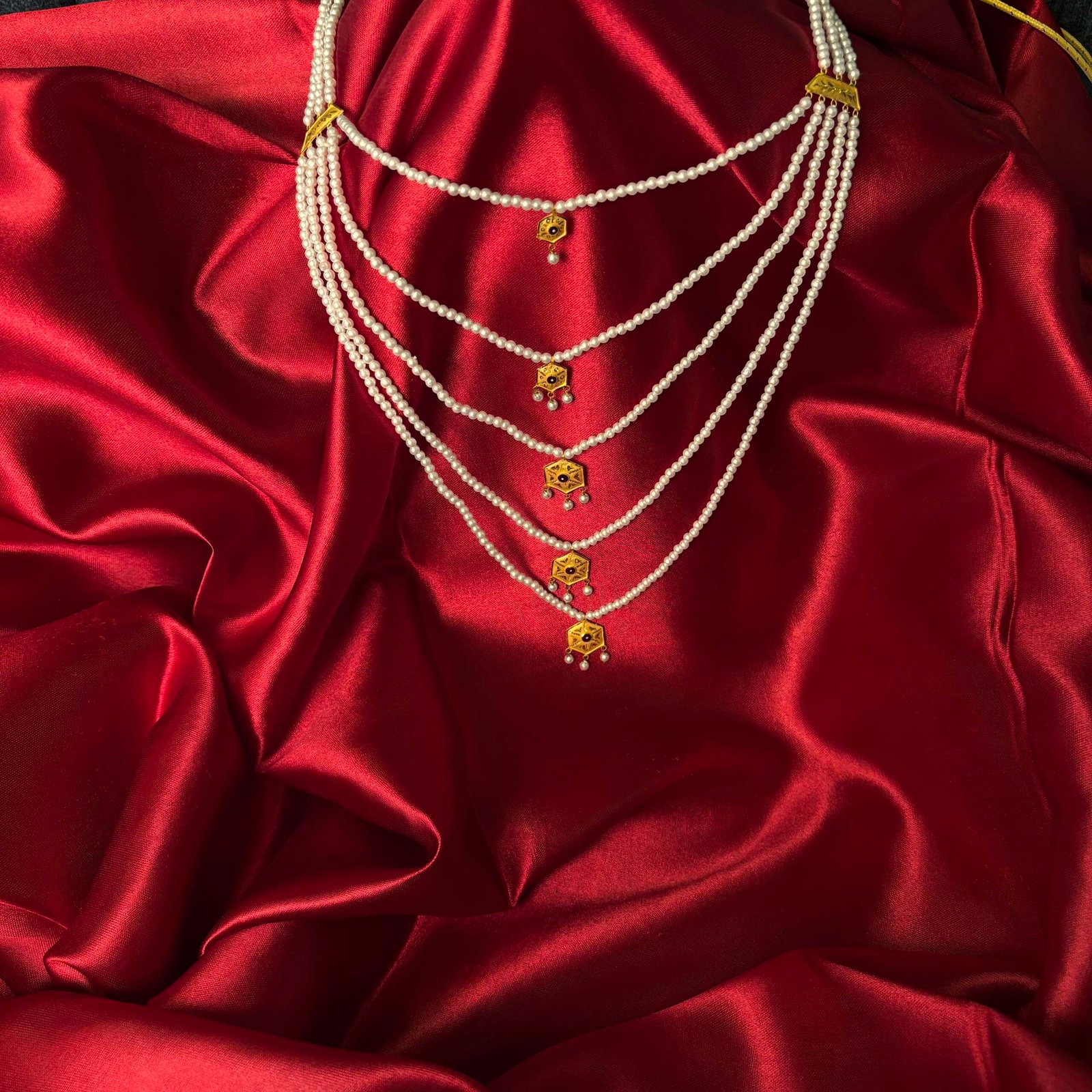 Layered Multi-Strand Pearl Necklace with Gold Motifs